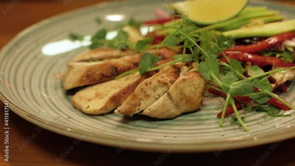 chef cooking delicious salad with with avocado and grilled chicken slow motion chef cooking delicious salad with with avocado and grilled chicken slow motion