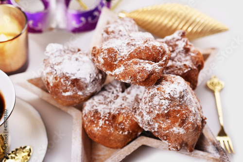 homemade doughnuts sprinkled with icing sugar called racuchy for carnival party