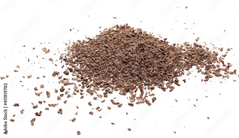 Chocolate shavings, grated flakes pile isolated on white background Chocolate shavings, grated flakes pile isolated on white background