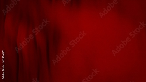 Abstract full-frame red flag cloth with selective focus waving in the wind. Concept 3D illustration background of colored garment with velvet satin texture as copy space backdrop and web banner.