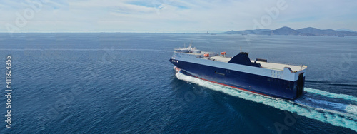 Canvas Print Aerial drone ultra wide photo of large RoRo (Roll on-off) vessel cruising the At