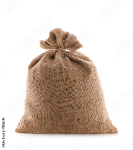 Tied burlap bag isolated on white. Organic material