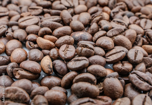 Background image with roasted brown coffee beans