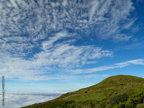 Pico island, green landscape, blue sky, travel destination Azores.