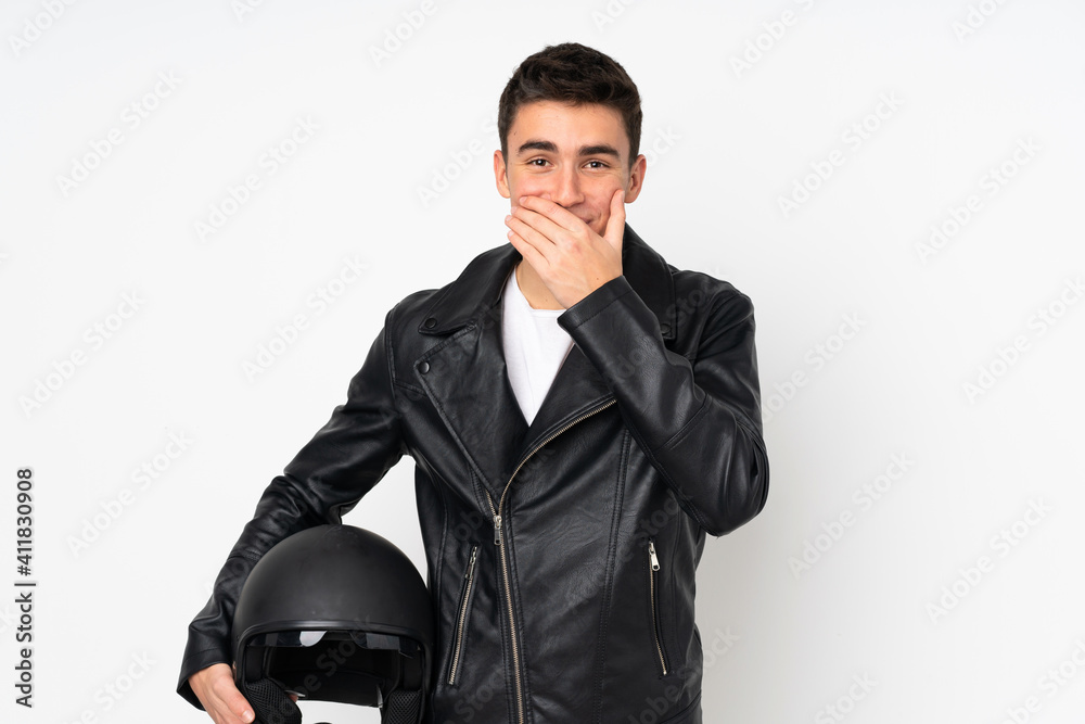 Man holding a motorcycle helmet isolated on white background with surprise facial expression Man holding a motorcycle helmet isolated on white background with surprise facial expression