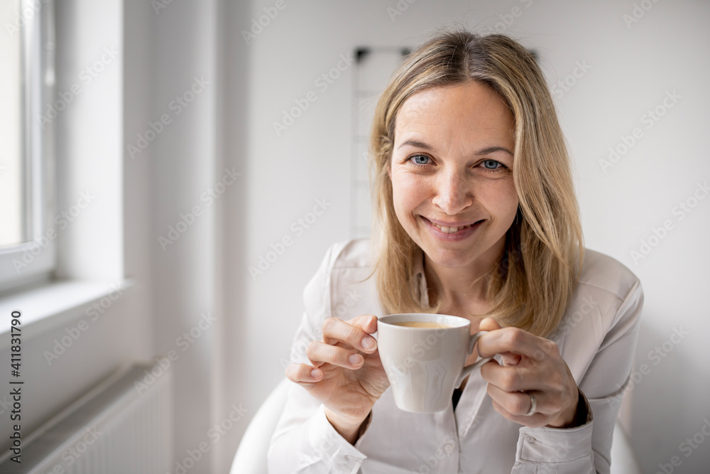 Business woman enjoy coffee break while working in 5office Business woman enjoy coffee break while working in 5office