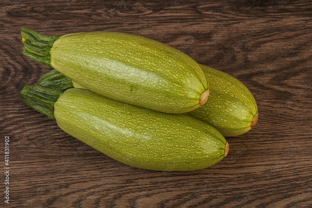 Young tasty zucchini over board Young tasty zucchini over board