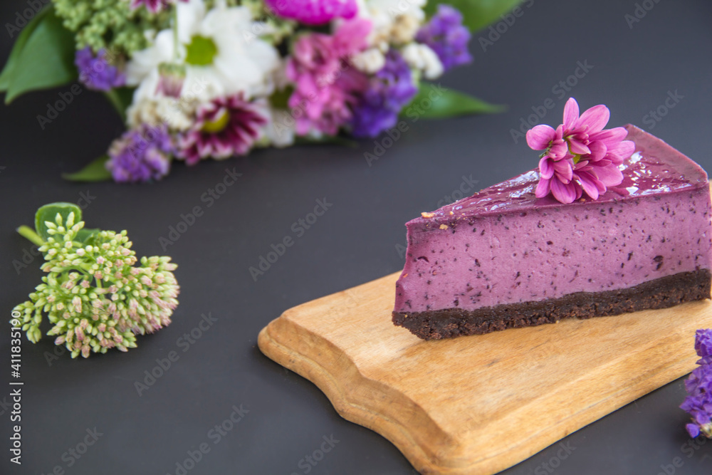  Juicy and fresh blueberries with green leaves. Creative atmospheric decoration