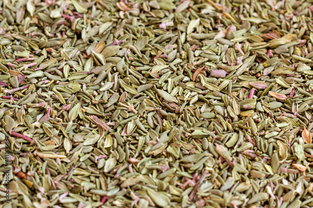 Dried and crushed thyme grass (Thymus). A fragrant plant used in medicine, cooking and cosmetology. Dried and crushed thyme grass (Thymus). A fragrant plant used in medicine, cooking and cosmetology.