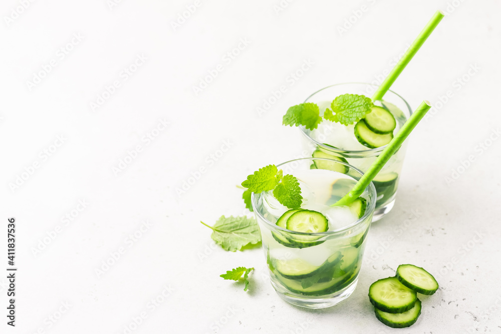 Herbal cucumber iced tea cocktail. Space for text. Herbal cucumber iced tea cocktail. Space for text.