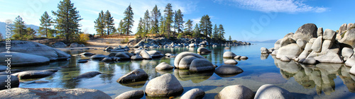Morning sun causes shadows on the boulders at Sand Harbor Lake Tahoe Panorama