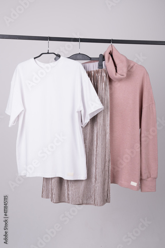 The concept of casual comfortable women's clothing in pastel shades, basic spring wardrobe