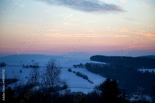 Fototapeta Naklejka Na Ścianę i Meble -  beautiful sunset over mountain range with Tatra Mountains on the horizon