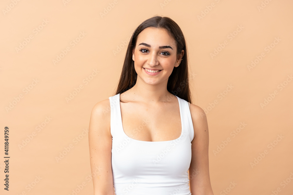 Young caucasian woman isolated on beige background . Portrait Young caucasian woman isolated on beige background . Portrait