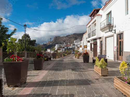 Tejeda, Gran Canaria, Canary Islands, Spain December 15, 2020: Main street in Tejeda Picturesque Canarian village at inland mountain valley on sunny day photo