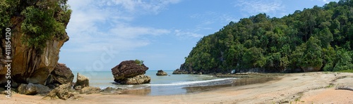 Sandy beach (Telok Paku) with rocks in Bako National Park, Borneo, Sarawak, Malaysia