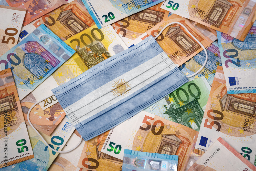 Medical mask with the flag of Argentina on a variety of european banknotes.(series) Medical mask with the flag of Argentina on a variety of european banknotes.(series)