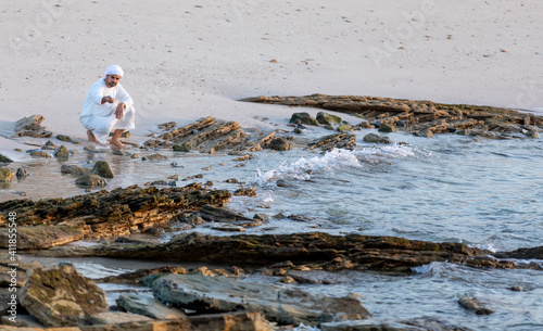 emirati man on the beach