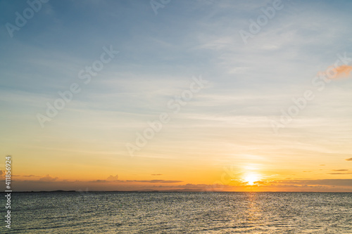 Sunset sky over sea in the evening with colorful sunlight, Dusk sky.