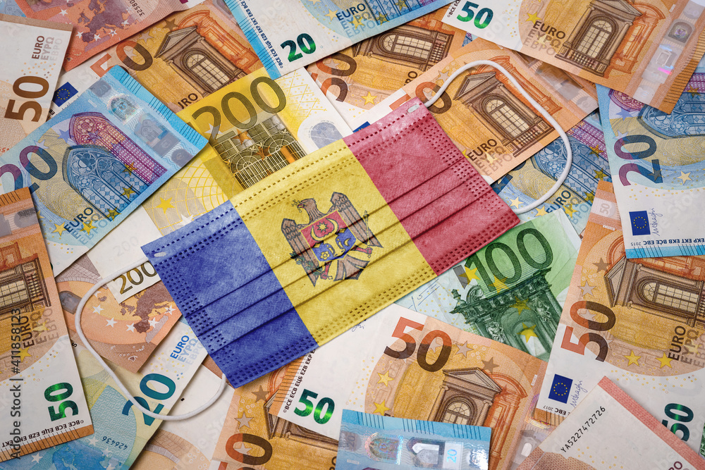 Medical mask with the flag of Moldova on a variety of european banknotes.(series) Medical mask with the flag of Moldova on a variety of european banknotes.(series)