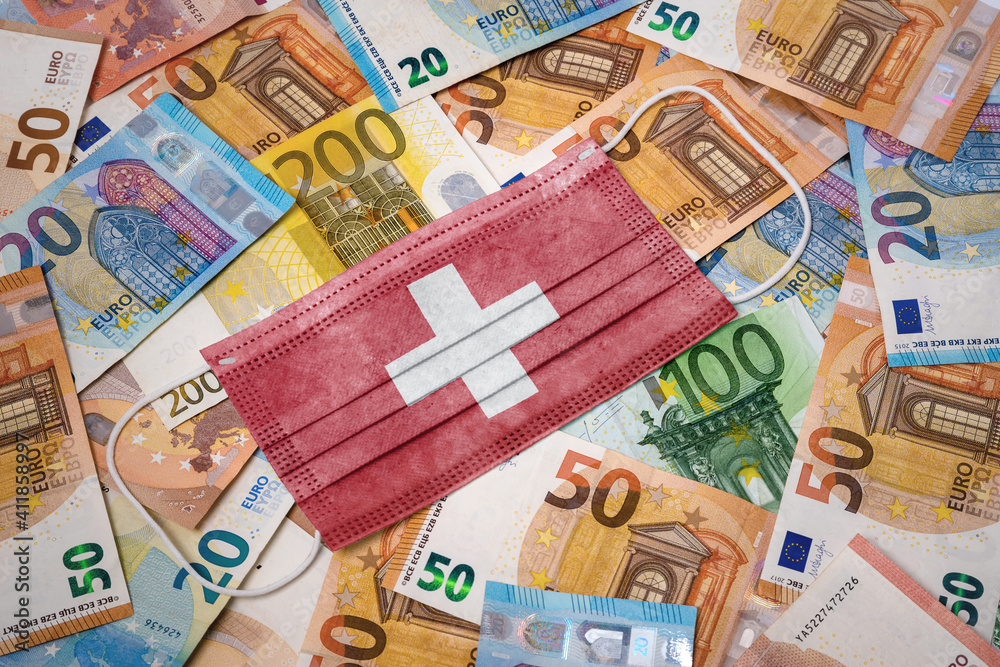 Medical mask with the flag of Switzerland on a variety of european banknotes.(series) Medical mask with the flag of Switzerland on a variety of european banknotes.(series)
