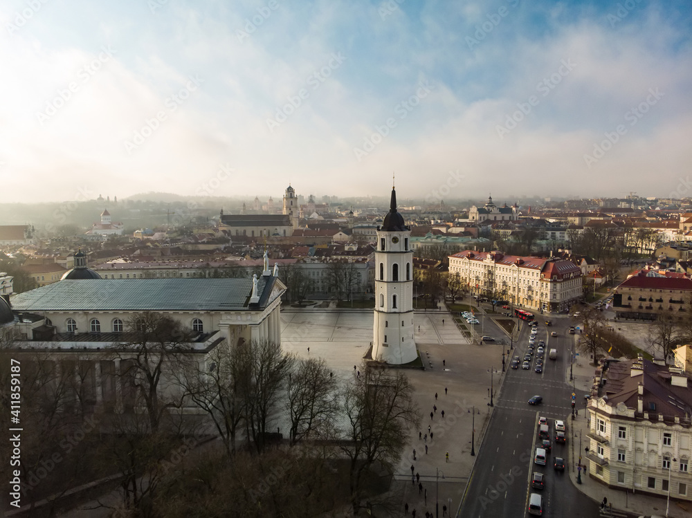 Beautiful sunny Vilnius city scene in winter. Aerial early morning view.