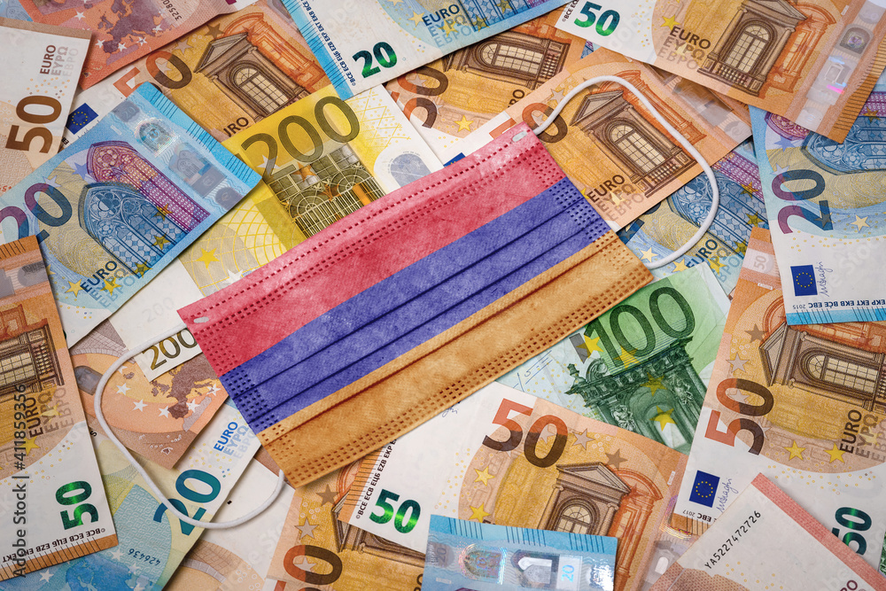 Medical mask with the flag of Armenia on a variety of european banknotes.(series) Medical mask with the flag of Armenia on a variety of european banknotes.(series)
