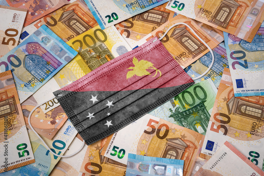 Medical mask with the flag of Papua New Guinea on a variety of european banknotes.(series) Medical mask with the flag of Papua New Guinea on a variety of european banknotes.(series)