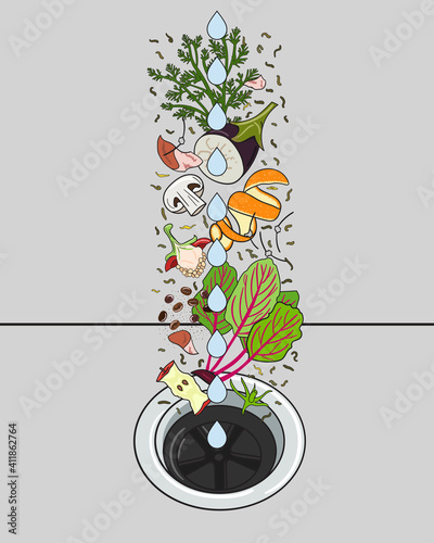 Food waste disposer for kitchen sink with kitchen scraps falling into it. Home garbage disposal. Recycling organic waste. Sustainable living, zero waste concept