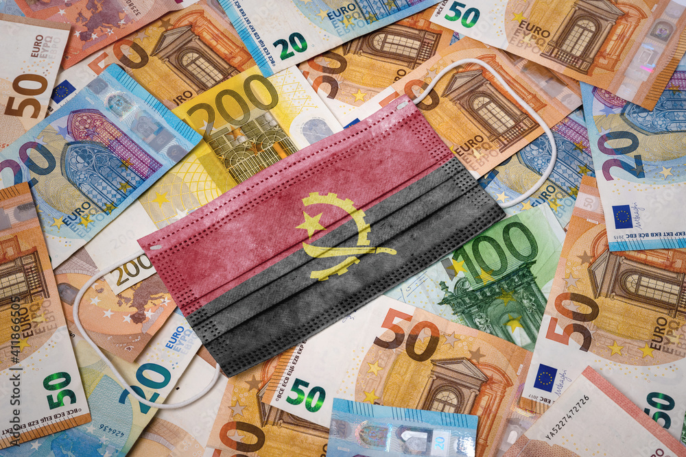 Medical mask with the flag of Angola on a variety of european banknotes.(series) Medical mask with the flag of Angola on a variety of european banknotes.(series)