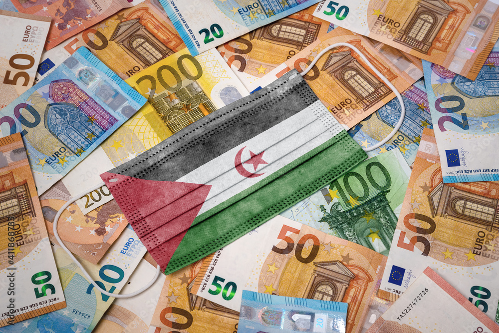 Medical mask with the flag of Western Sahara on a variety of european banknotes.(series) Medical mask with the flag of Western Sahara on a variety of european banknotes.(series)