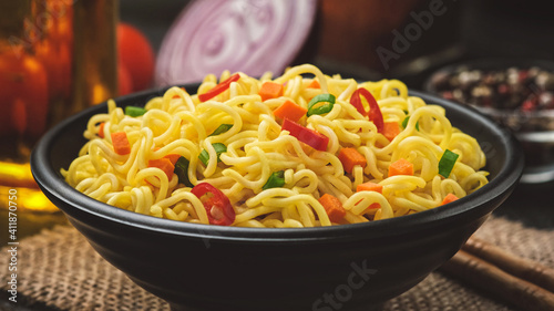 Instant noodles, served with vegetables and herbs
