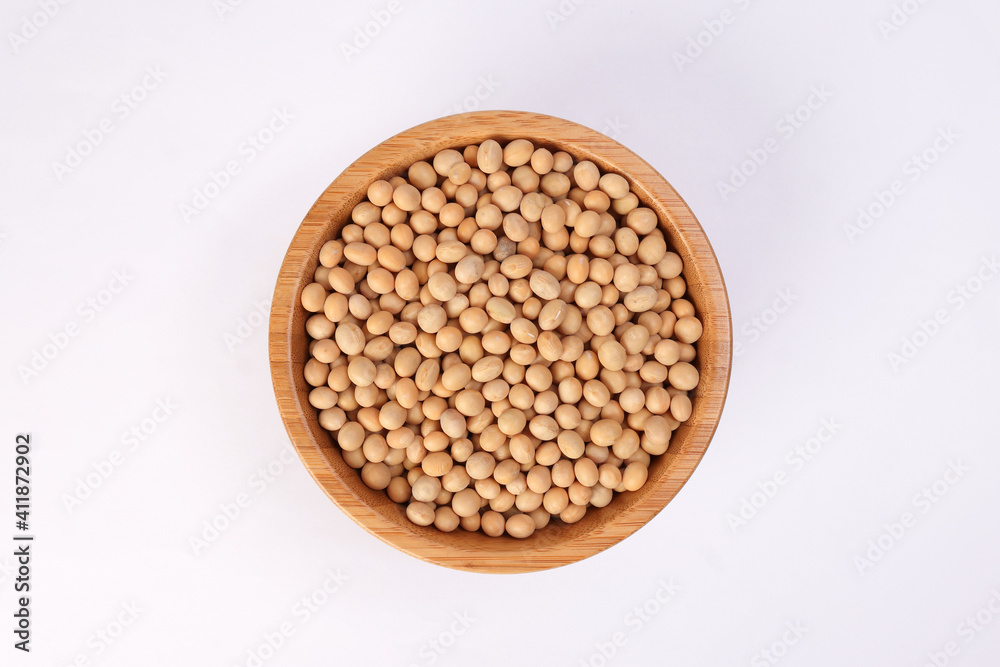Soya bean in wooden bowl on white background Soya bean in wooden bowl on white background