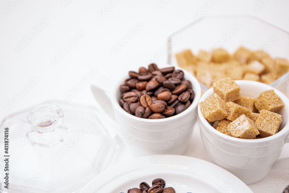 Coffee beans. White coffee cup. Background. Coffee beans. White coffee cup. Background.