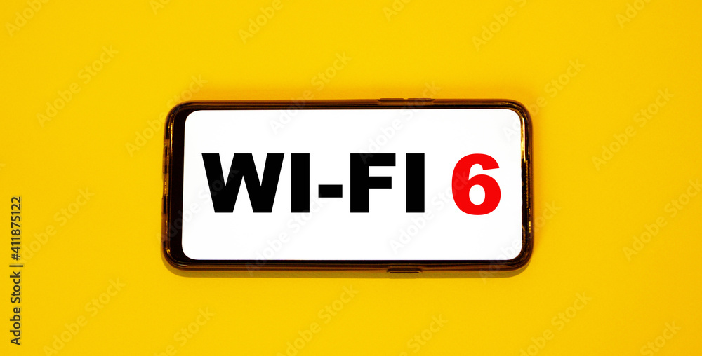 New standard WI-FI 6 - on a white background of a smartphone with an orange background New standard WI-FI 6 - on a white background of a smartphone with an orange background
