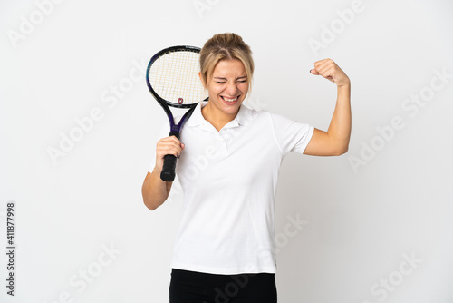 Young Russian woman tennis player isolated on white background doing strong gesture