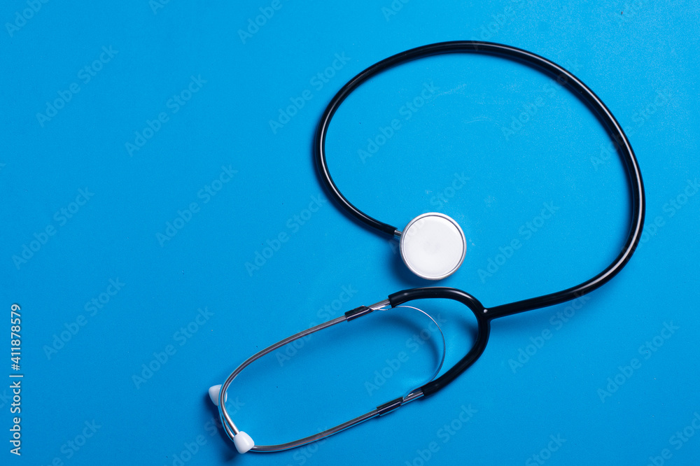 stethoscope on blue background stethoscope on blue background