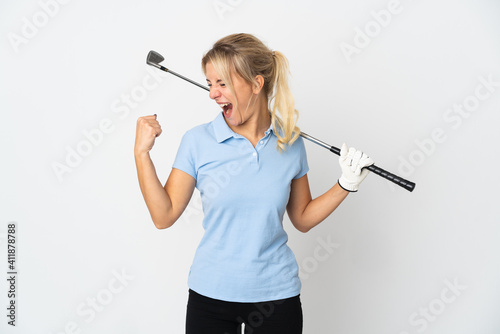 Young Russian golfer woman isolated on white background celebrating a victory