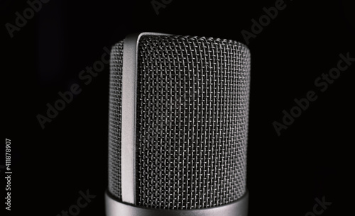 A microphone on black background photo