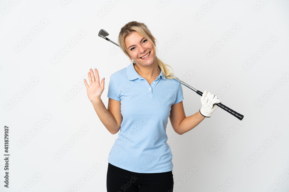 Young Russian golfer woman isolated on white background saluting with hand with happy expression Young Russian golfer woman isolated on white background saluting with hand with happy expression