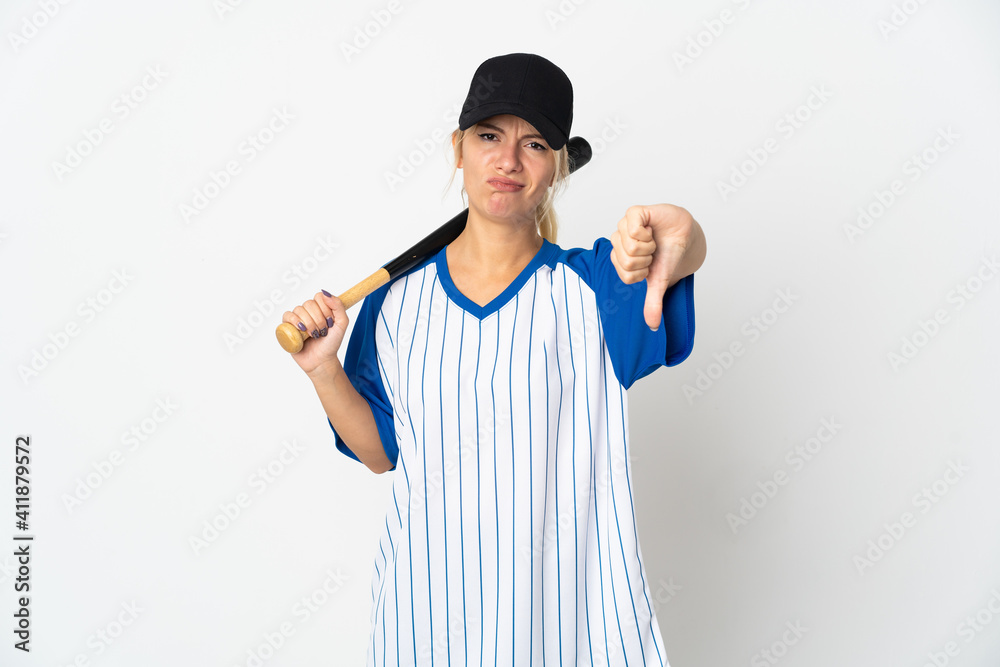 Young Russian woman playing baseball isolated on white background showing thumb down with negative expression Young Russian woman playing baseball isolated on white background showing thumb down with negative expression
