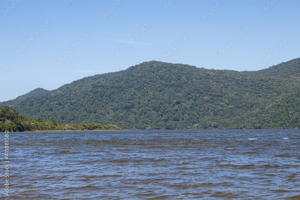 landscape with lake and mountains located in Florianopolis, Lagoa do Peri, Santa Catarina, Brazil, Florianópolis