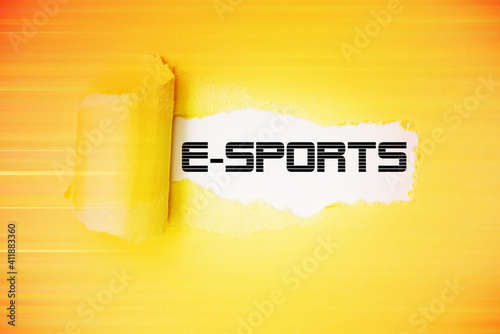 Illustration of torn paper with the word E-Sports. photo