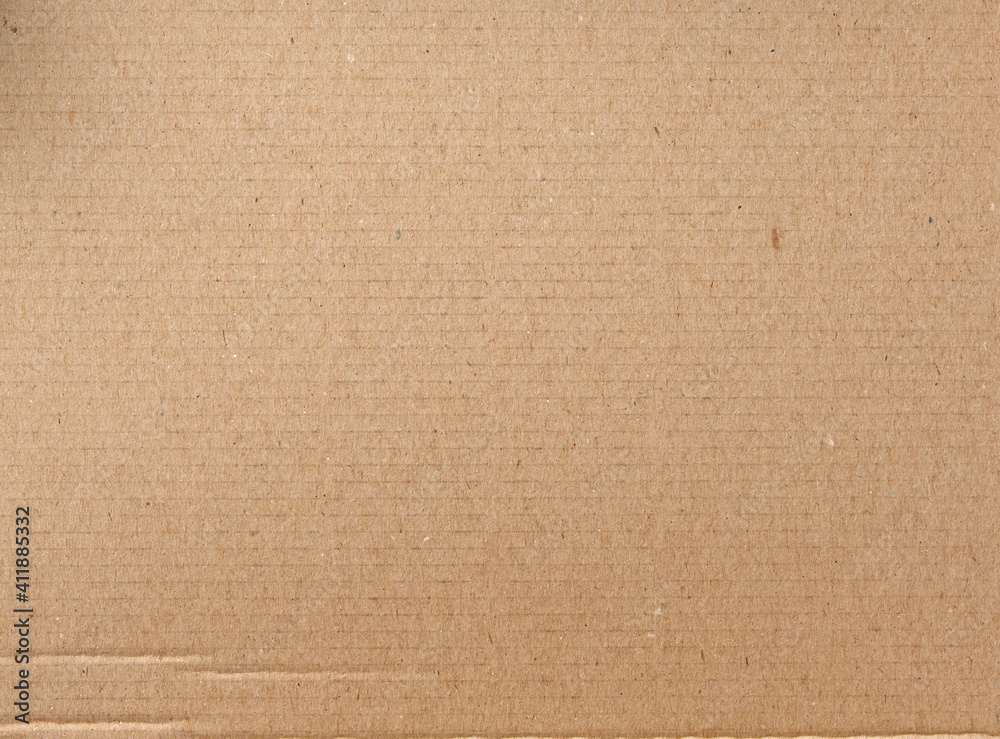 Fototapeta premium smooth brown cardboard paper, full frame