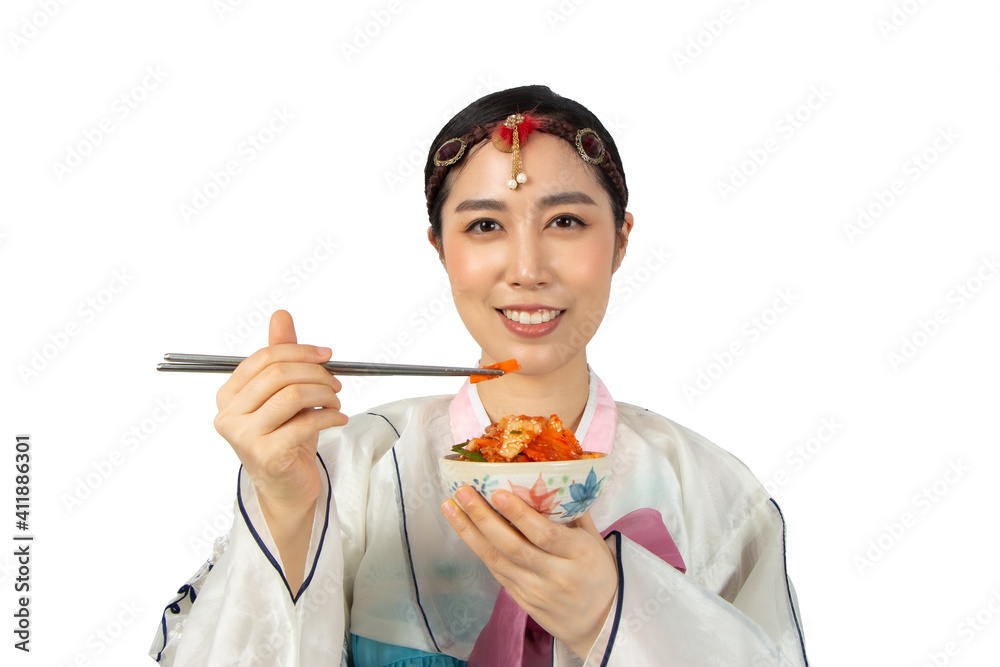 Partial view of Women wearing Korean Hanbok dress eating Kimchi kimgee isolate on white background. Partial view of Women wearing Korean Hanbok dress eating Kimchi kimgee isolate on white background.