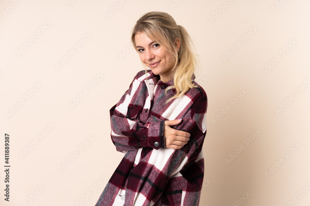 Blonde woman over isolated background laughing Blonde woman over isolated background laughing