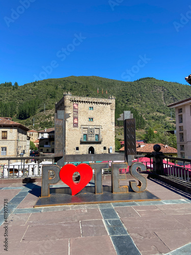 Potes, Spain - September 2, 2020: View of Potes sign with red heart at the Capitan Palacios Square. photo