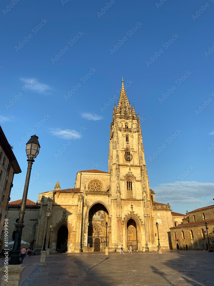 Oviedo, Spain - September 4, 2020: The Metropolitan Cathedral Basilica of the Holy Saviour at sunset. Gothic cathedral located in the city of Oviedo, Asturias. It is also known as Sancta Ovetensis. Oviedo, Spain - September 4, 2020: The Metropolitan Cathedral Basilica of the Holy Saviour at sunset. Gothic cathedral located in the city of Oviedo, Asturias. It is also known as Sancta Ovetensis.