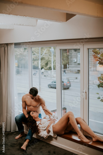 Loving couple sitting on th...