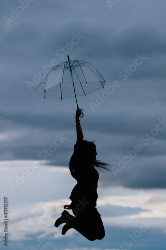 silhouette of a young woman jumping © Joseph Table